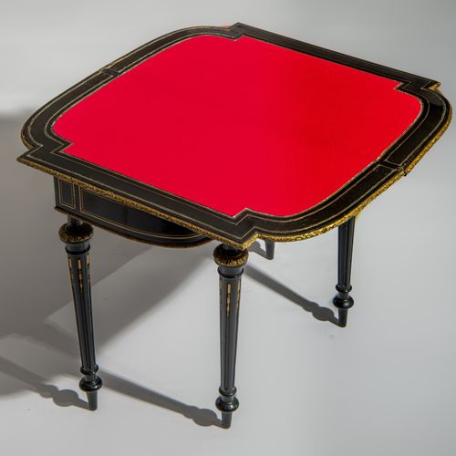 A Napoleon III ebonised fold-over games table, H 72 - 74 - W 87 - D 43 - 87 cm 一&hellip;