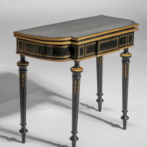 A Napoleon III ebonised fold-over games table, H 72 - 74 - W 87 - D 43 - 87 cm M&hellip;