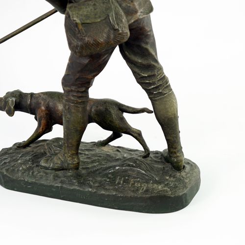 Null H.福格尔（1872-1944）《一个猎人和他的狗

雕塑

在露台上签名

20世纪

高度：44厘米