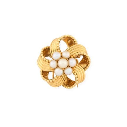 CARTIER Setting, 1950s
“Stylized Flower” lapel cli