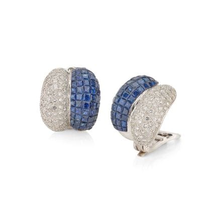 Pair of double-grooved earrings in 750‰ white gold