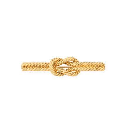 HERMES Paris, 1960s
“Flat Bow” brooch in 750‰ yell