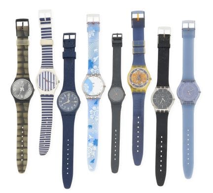 SWATCH 
8er-Set Kunststoffuhren, runde Gehäuse, Qu