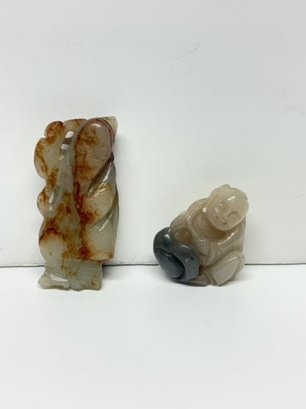 China, 20. Jahrhundert
Zwei Statuetten aus Jade un