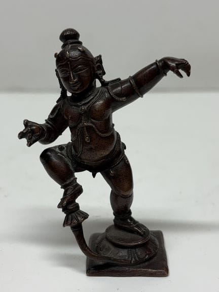 Indien, 20. Jahrhundert
Kleine Figur aus patiniert