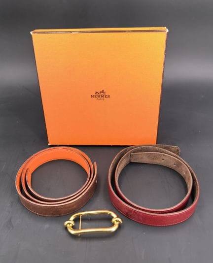 Hermès, two reversible leather belts with gold buc