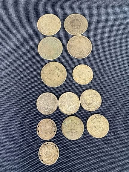 A set of silver small change coins, consisting of 