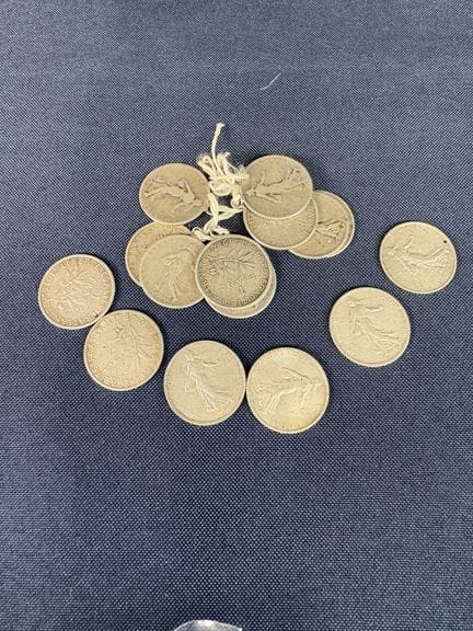 A set of 15 silver 1-franc "Semeuse" coins, 9 of w