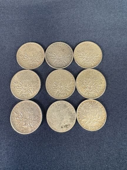 A set of silver coins, consisting of:
- 7 5-franc 