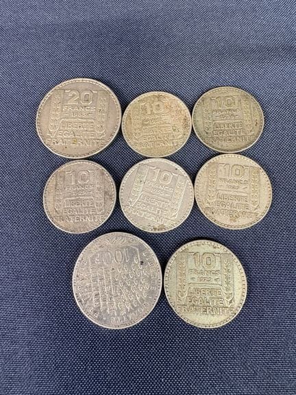 A set of silver coins, consisting of:
- 1 20-franc