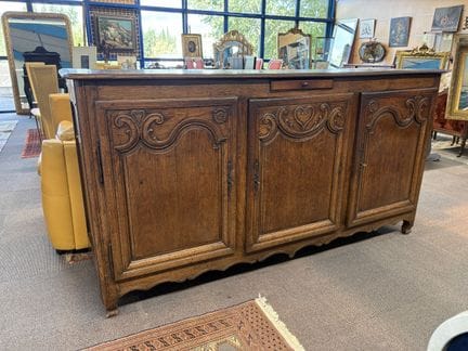 Three-door sideboard made of natural wood, molded 