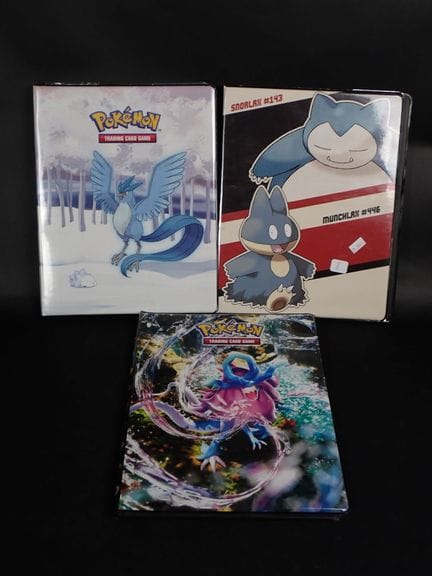 Cartes Pokemon 
Contenu: Ensemble de 3 classeurs p