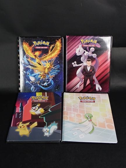 Cartes Pokemon 
Contenu: Ensemble de 3 classeurs p