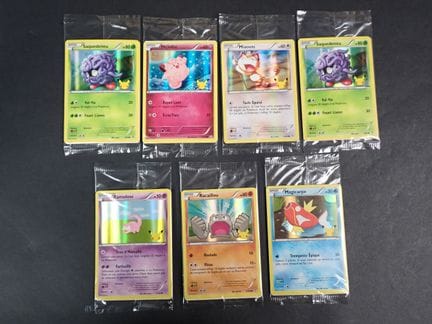 Carta Pokémon 
Contenuto: Set di 7 carte comuni tr