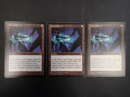 Magic: The Gathering 
Contenuto: Set di 3 "Cursed 