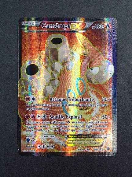 Carta Pokémon 
Contenuto: 1 carta rara Camerupt EX