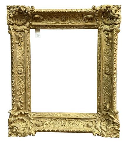 摄政风格画框（38.5 x 30 x 10 厘米）
橡木画框，饰有贝壳、叶片及镂空的猪尾纹样。
38