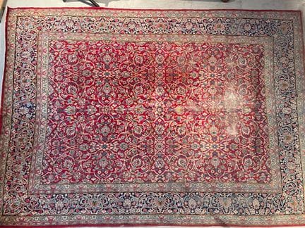 ORIENTAL RUG made of wool with floral and geometri