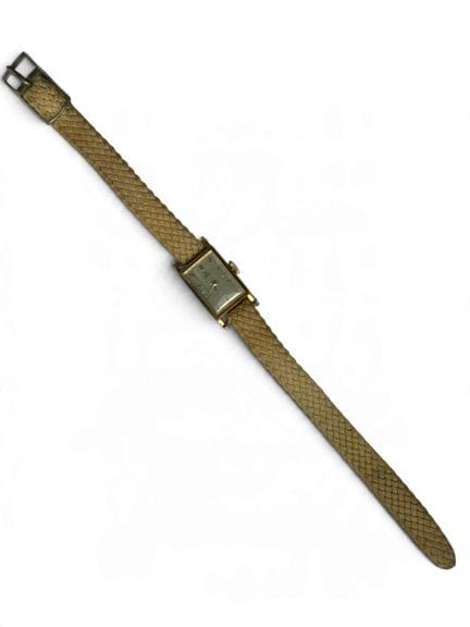 MONTRE DAME SUR BRACELET EN CORDE TRESSÉ en or jau
