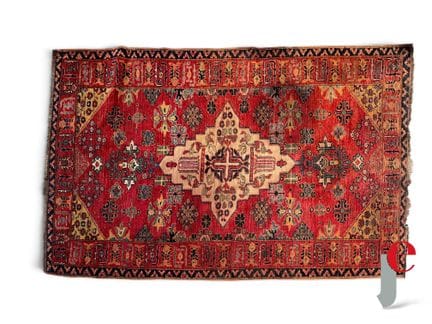 ORIENTAL RUG made of wool, featuring a geometric p