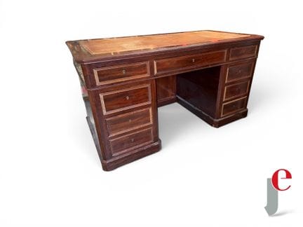 Flat mahogany desk with a green leather-covered to