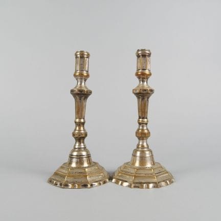 Pair of Louis XIV-style metal candlesticks or torc