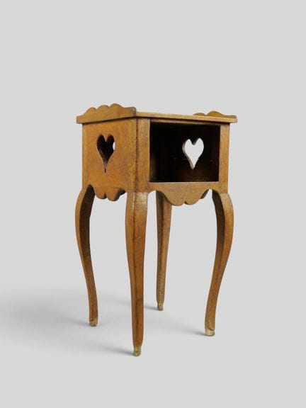 Wooden nightstand with one niche and an openwork h