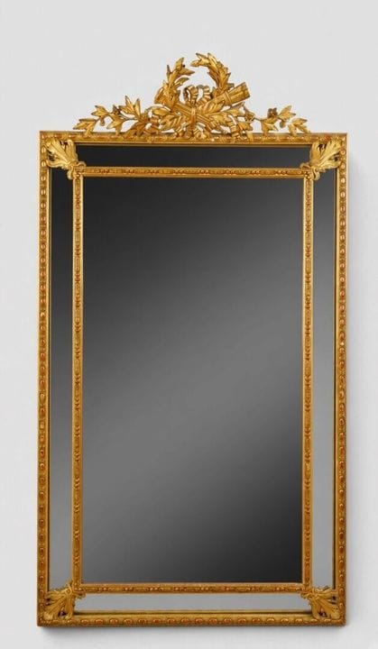 Miroir en bois et stuc doré à profil renversé, fro