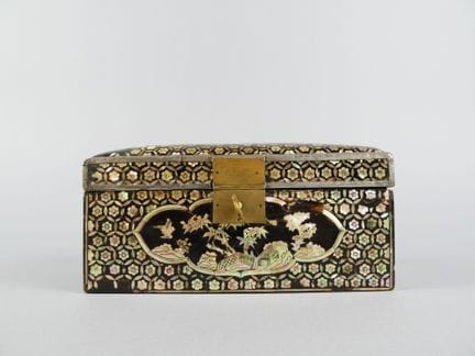 Small blackened wooden box with Asian-style mother