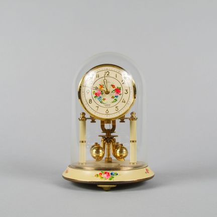 KERN for LANCEL in Paris. Table clock under a gild