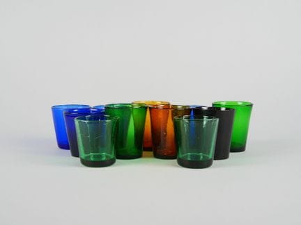 11 small, colorful glass cups.
Height: approx. 7 c
