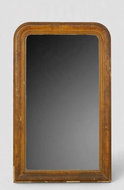 Miroir de cheminée en bois et stuc patiné brun.
XI