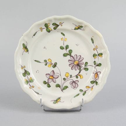 SUD-OVEST
Piatto in maiolica smaltata con bordo de