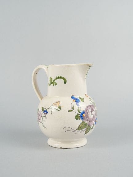 SUD-OVEST
Brocca in maiolica smaltata con decorazi