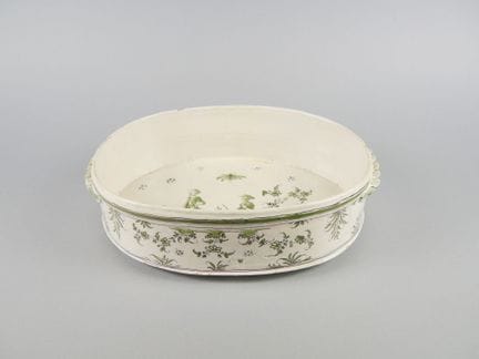 BORDEAUX
Vaso ovale in maiolica smaltata con decor