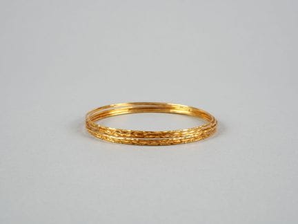 Bracciale detto “settimanale” in oro giallo 9K (37