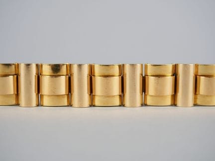 Bracciale articolato in oro giallo 14K (585 milles