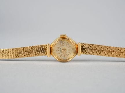 ROBUR. Ladies' watch with an 18K yellow gold case 