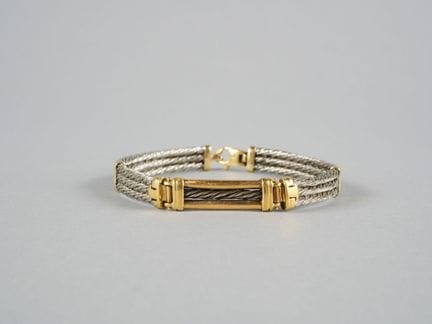FRED, in stile. Bracciale da uomo in oro 18 carati