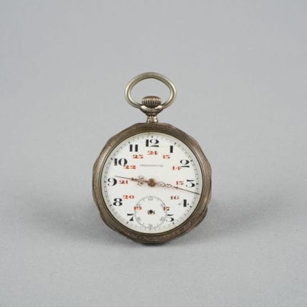 Pocket watch with a silver case. White enamel dial