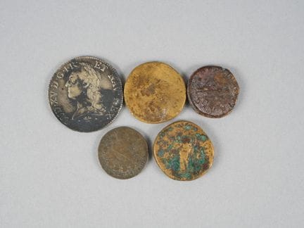 5 Coins:
- 3 coins, likely Roman.
Gross Weight: 65