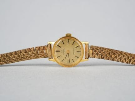OMEGA. Orologio da polso da donna in metallo dorat