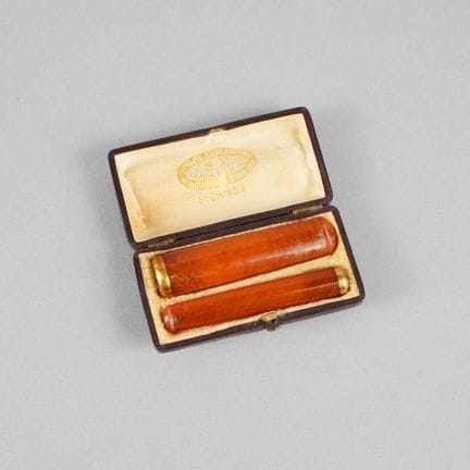 Portasigari e portasigarette con anelli in oro gia