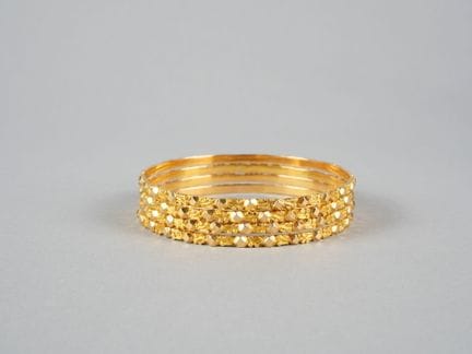 4 braccialetti a maglie in oro giallo 18 carati (7