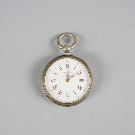Pocket watch with a silver case. White enamel dial