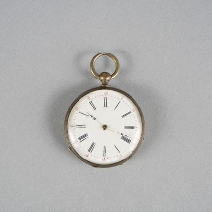 Pocket watch with a silver case and bezel. White e