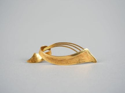 Brosche aus 18 Karat Gelbgold (750/1000).
750er-St