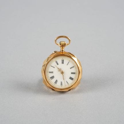 Collar watch with an 18K yellow gold case and beze