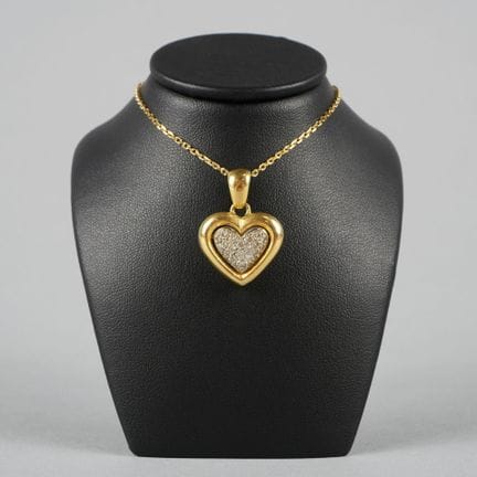 Ciondolo a forma di cuore in oro giallo e grigio 1