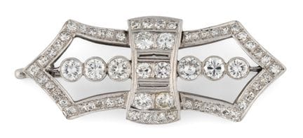 Brooch   Circa 1930. Platinum. Brilliant-cut and r